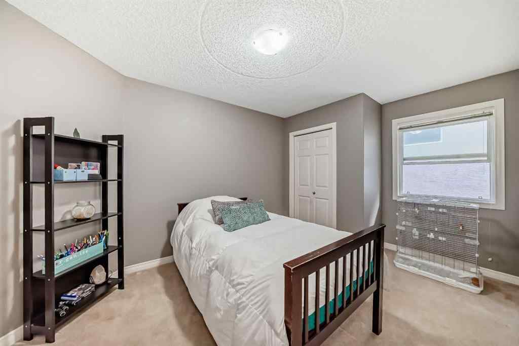 MLS® A2234921 - 73 Crestmont Drive SW in Crestmont Calgary, Residential