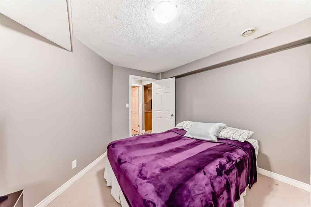 MLS® A2234921 - 73 Crestmont Drive SW in Crestmont Calgary, Residential