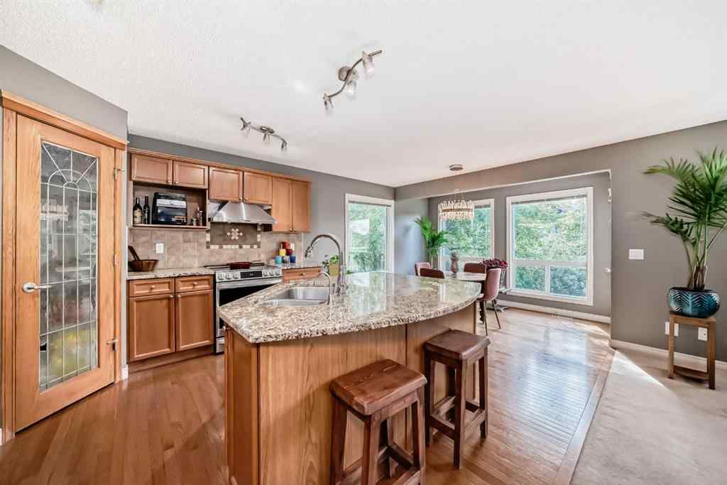 MLS® A2234921 - 73 Crestmont Drive SW in Crestmont Calgary, Residential