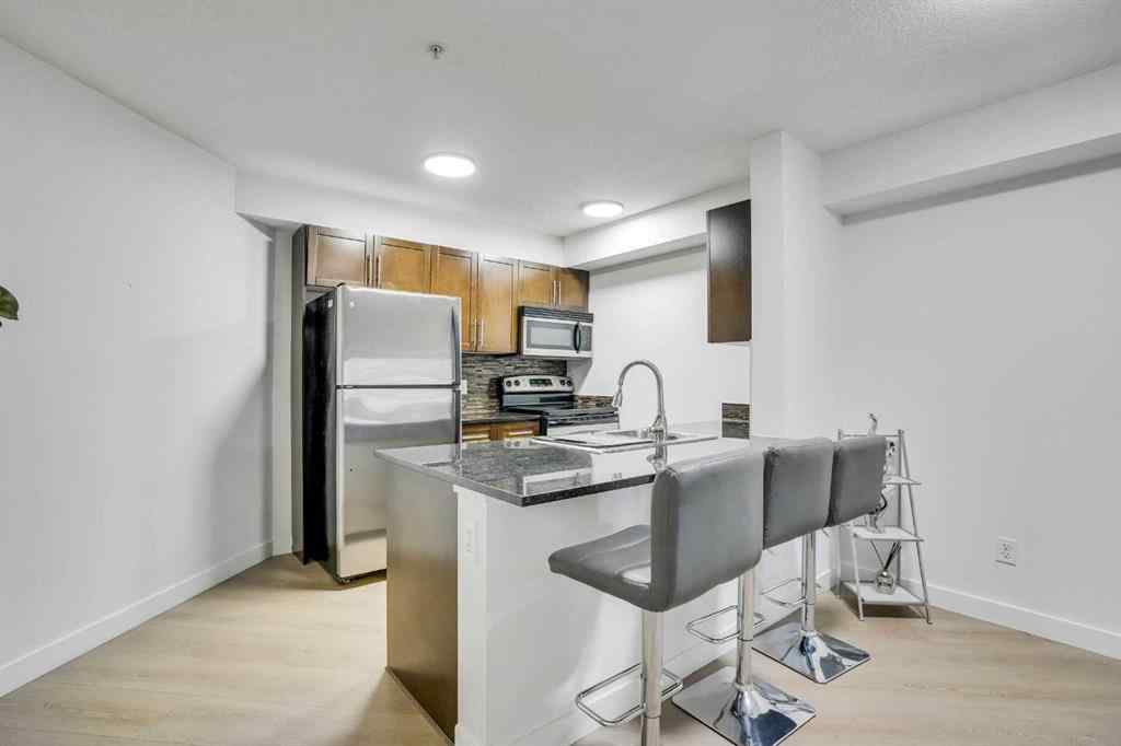 MLS® A2234932 - Unit #220 7180 80 Avenue NE in Saddle Ridge Calgary, Residential