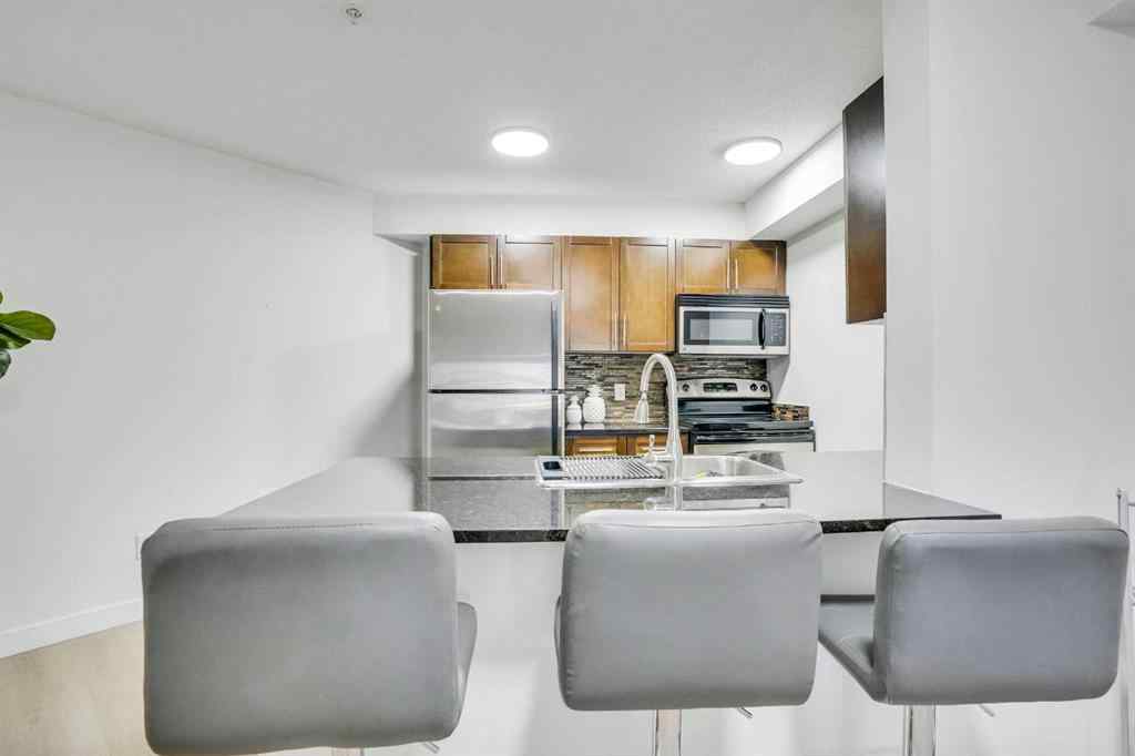 MLS® A2234932 - Unit #220 7180 80 Avenue NE in Saddle Ridge Calgary, Residential