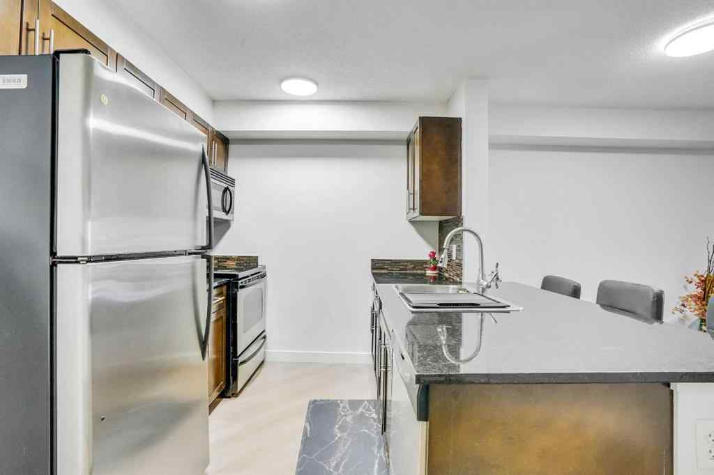 MLS® A2234932 - Unit #220 7180 80 Avenue NE in Saddle Ridge Calgary, Residential