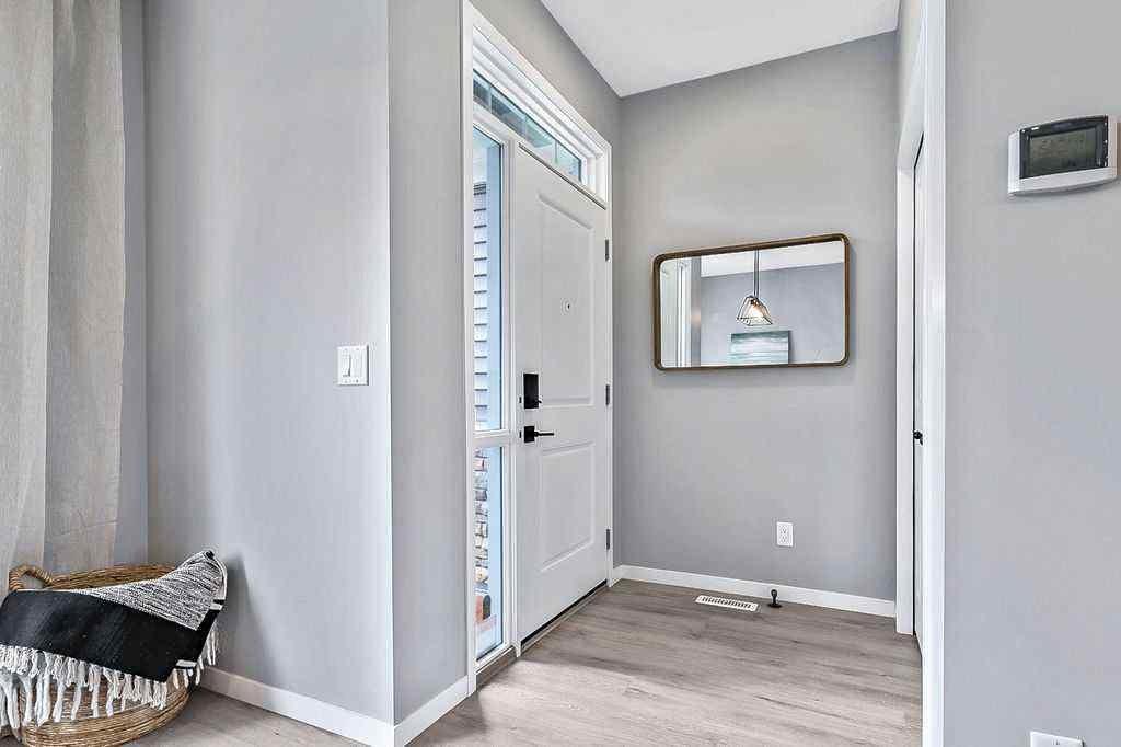 MLS® A2234987 - 90 Wolf Gate  in Wedderburn Okotoks, Residential