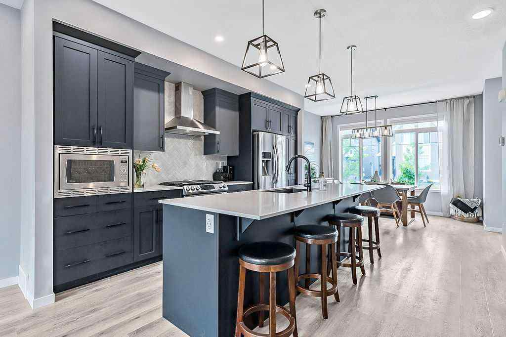 MLS® A2234987 - 90 Wolf Gate  in Wedderburn Okotoks, Residential