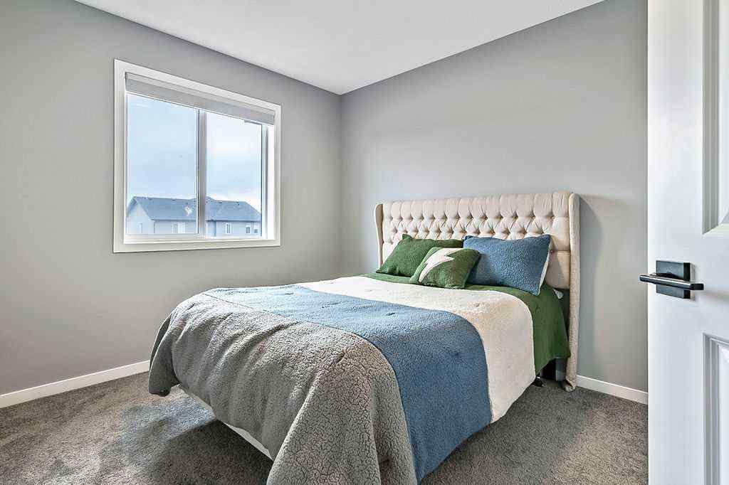 MLS® A2234987 - 90 Wolf Gate  in Wedderburn Okotoks, Residential