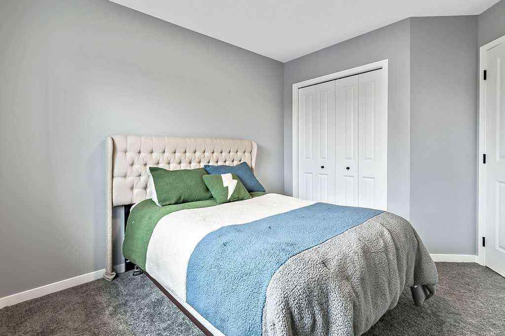 MLS® A2234987 - 90 Wolf Gate  in Wedderburn Okotoks, Residential