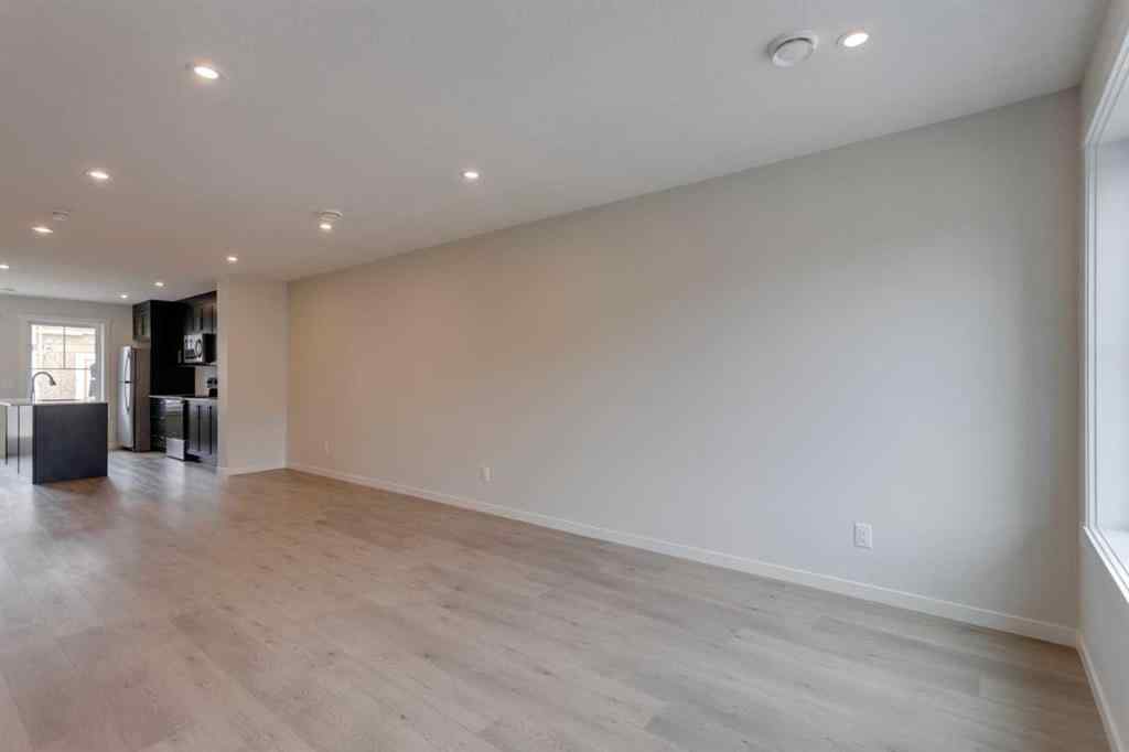 MLS® A2235000 - 14653 1 Street NE in Livingston Calgary, Residential