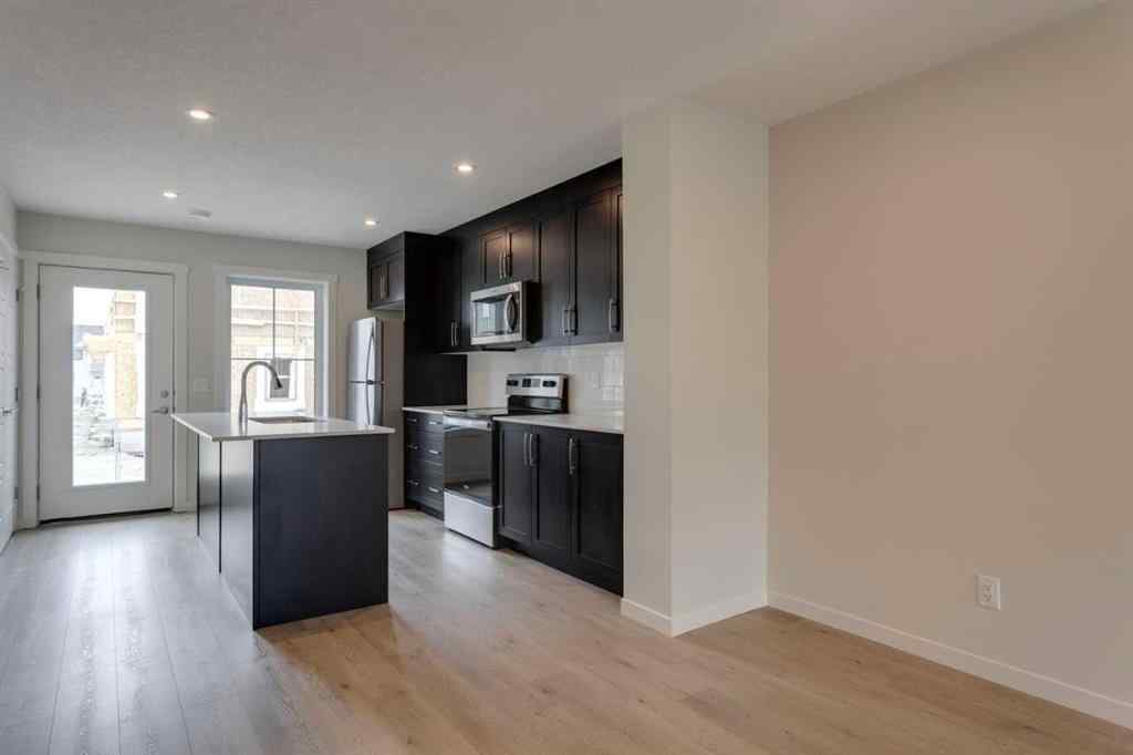 MLS® A2235000 - 14653 1 Street NE in Livingston Calgary, Residential