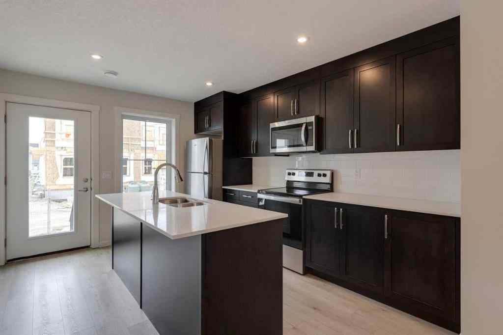 MLS® A2235000 - 14653 1 Street NE in Livingston Calgary, Residential