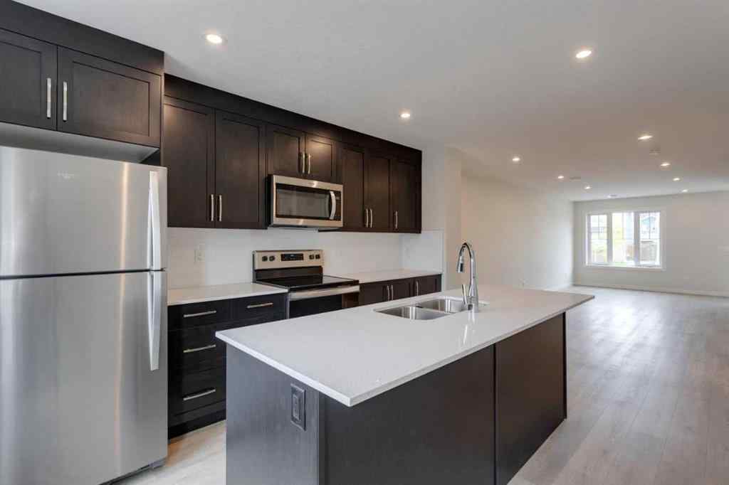 MLS® A2235000 - 14653 1 Street NE in Livingston Calgary, Residential