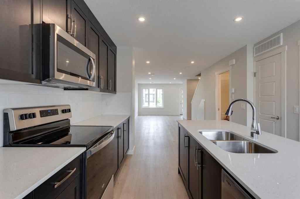 MLS® A2235000 - 14653 1 Street NE in Livingston Calgary, Residential