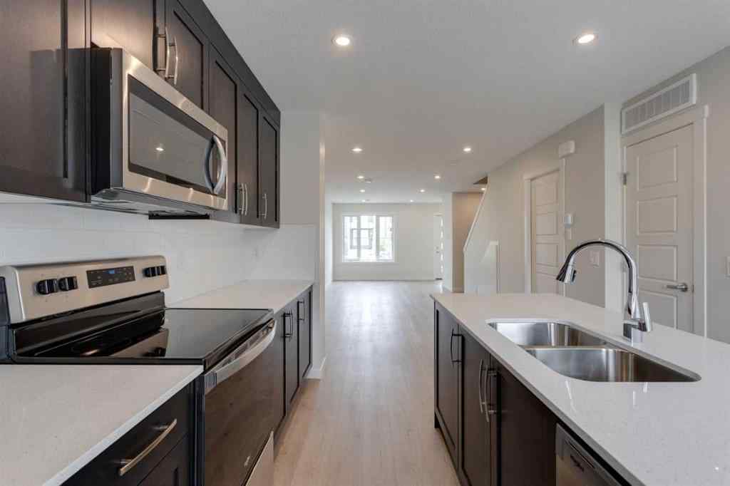 MLS® A2235000 - 14653 1 Street NE in Livingston Calgary, Residential
