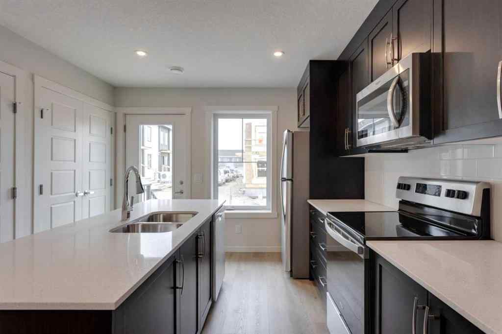 MLS® A2235000 - 14653 1 Street NE in Livingston Calgary, Residential
