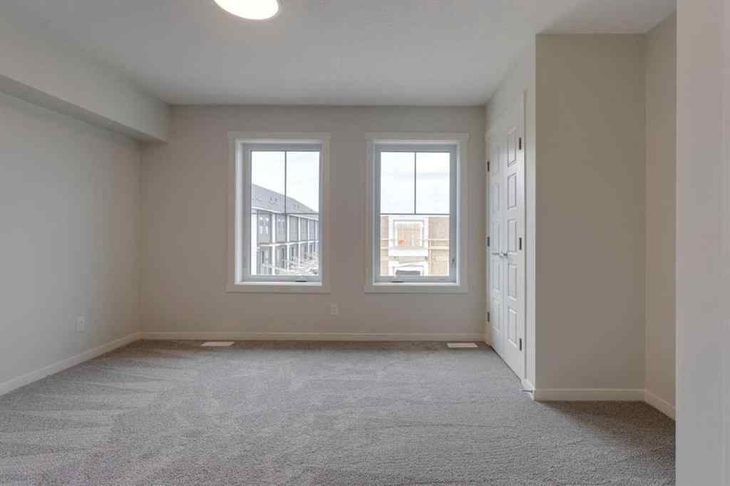 MLS® A2235000 - 14653 1 Street NE in Livingston Calgary, Residential