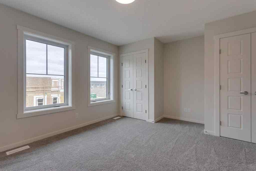 MLS® A2235000 - 14653 1 Street NE in Livingston Calgary, Residential