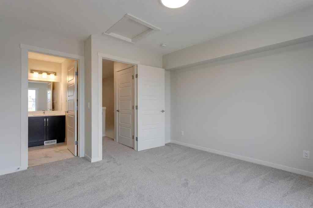 MLS® A2235000 - 14653 1 Street NE in Livingston Calgary, Residential