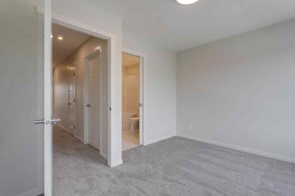 MLS® A2235000 - 14653 1 Street NE in Livingston Calgary, Residential