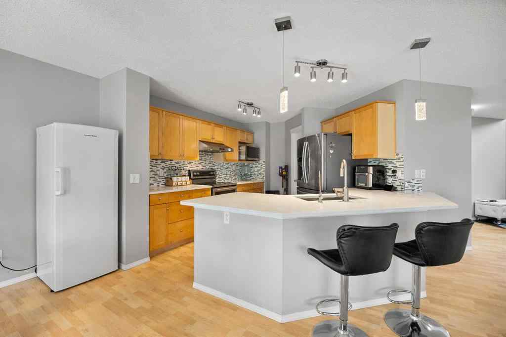 MLS® A2235015 - 204 Evansbrooke Landing NW in Evanston Calgary, Residential