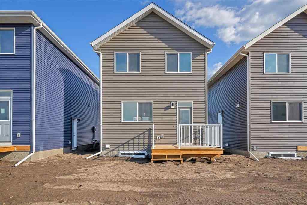 MLS® A2235036 - 74 Wedderburn Drive  in Wedderburn Okotoks, Residential