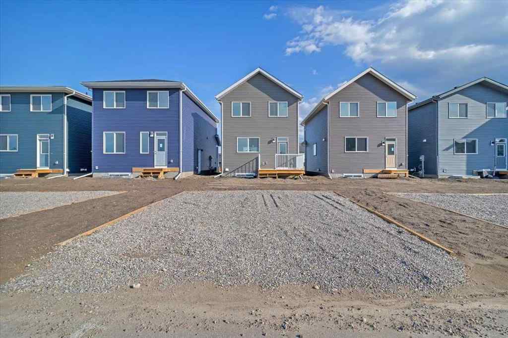 MLS® A2235036 - 74 Wedderburn Drive  in Wedderburn Okotoks, Residential