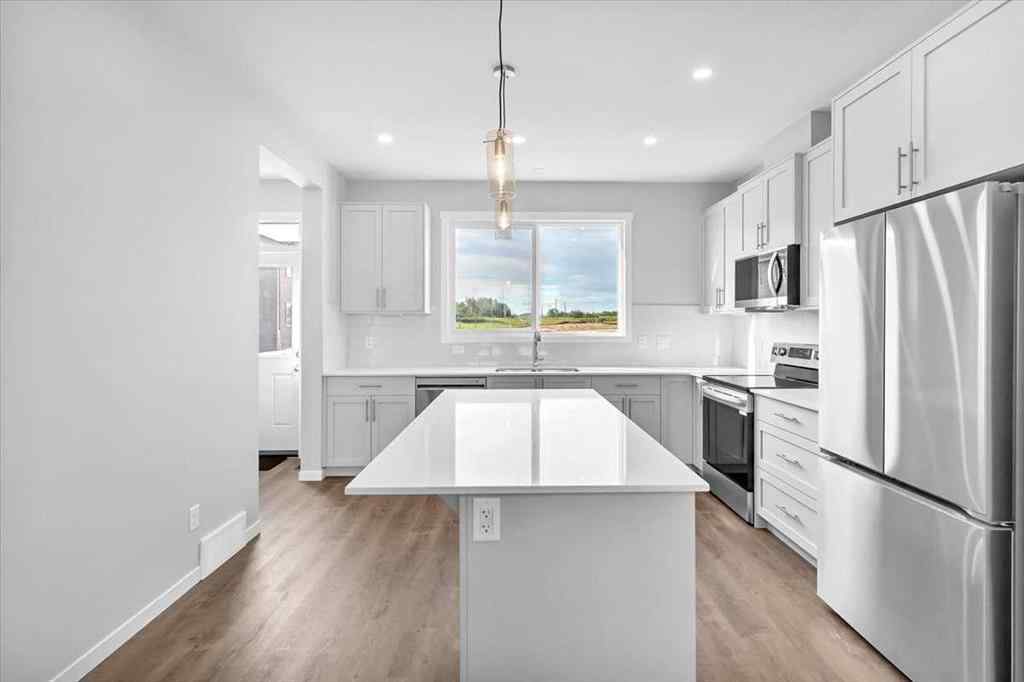 MLS® A2235036 - 74 Wedderburn Drive  in Wedderburn Okotoks, Residential