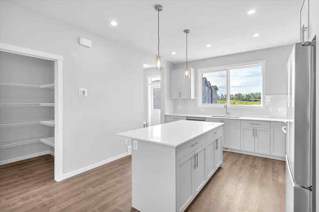 MLS® A2235036 - 74 Wedderburn Drive  in Wedderburn Okotoks, Residential