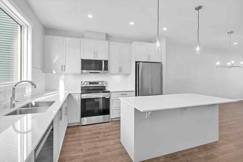 MLS® A2235036 - 74 Wedderburn Drive  in Wedderburn Okotoks, Residential