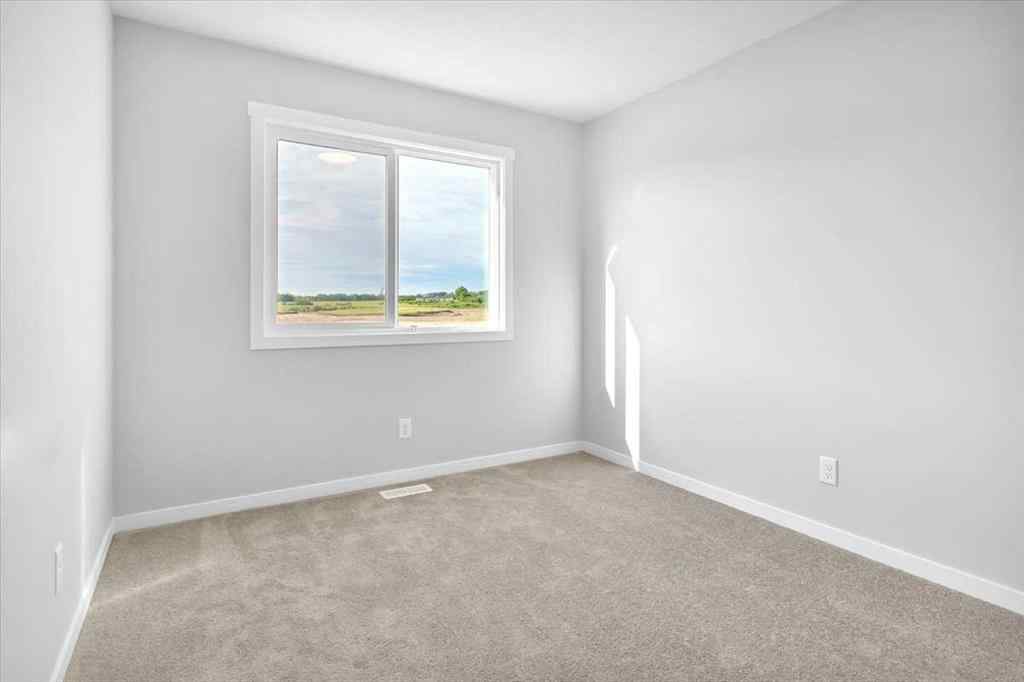 MLS® A2235036 - 74 Wedderburn Drive  in Wedderburn Okotoks, Residential