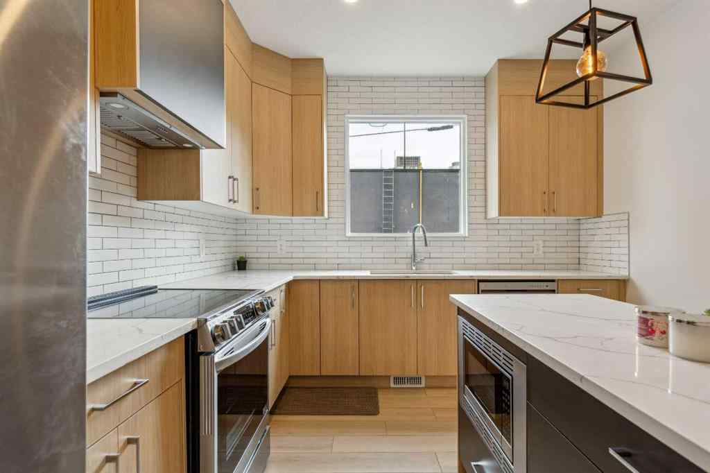 MLS® A2235097 - Unit #1 413 13 Avenue NE in Renfrew Calgary, Residential