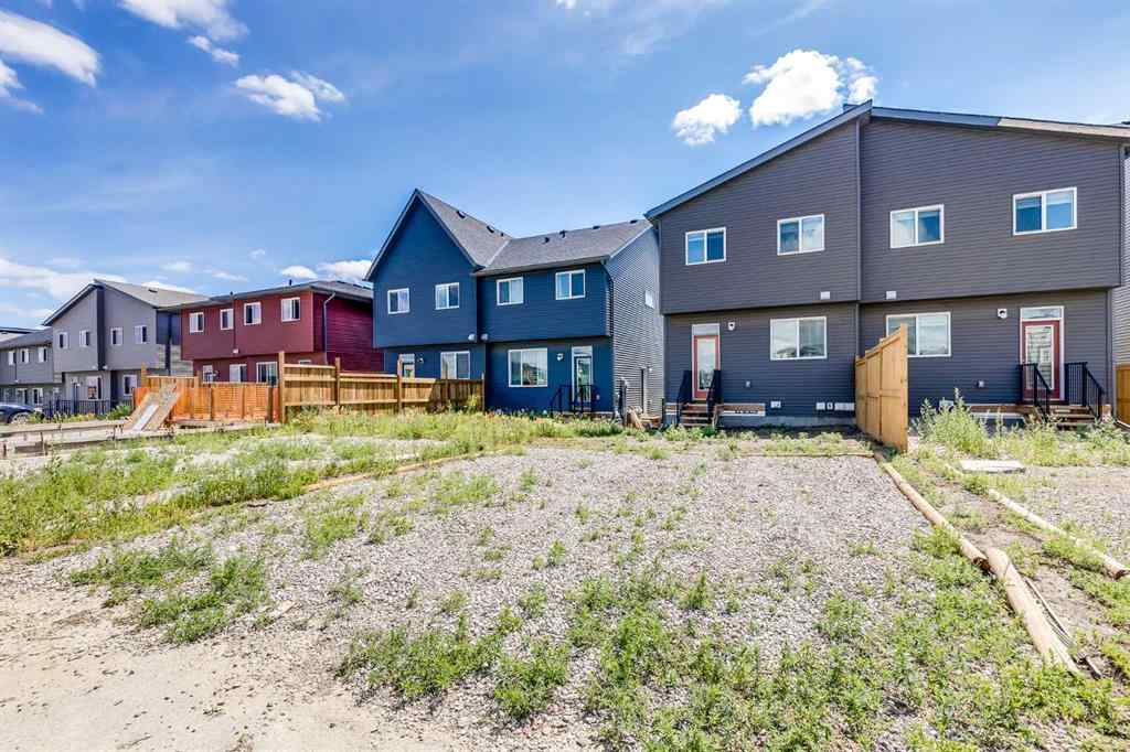 MLS® A2235108 - 61 Belmont Drive SW in Belmont Calgary, Residential