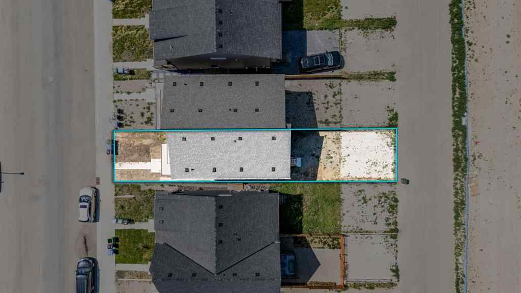 MLS® A2235108 - 61 Belmont Drive SW in Belmont Calgary, Residential