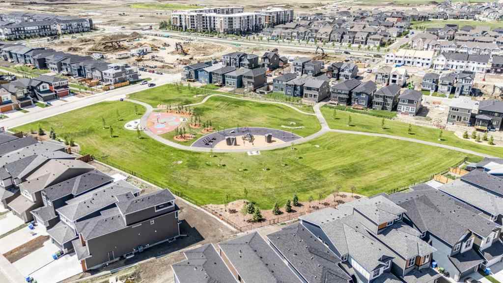 MLS® A2235108 - 61 Belmont Drive SW in Belmont Calgary, Residential