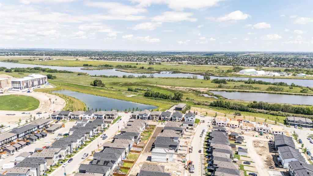 MLS® A2235108 - 61 Belmont Drive SW in Belmont Calgary, Residential