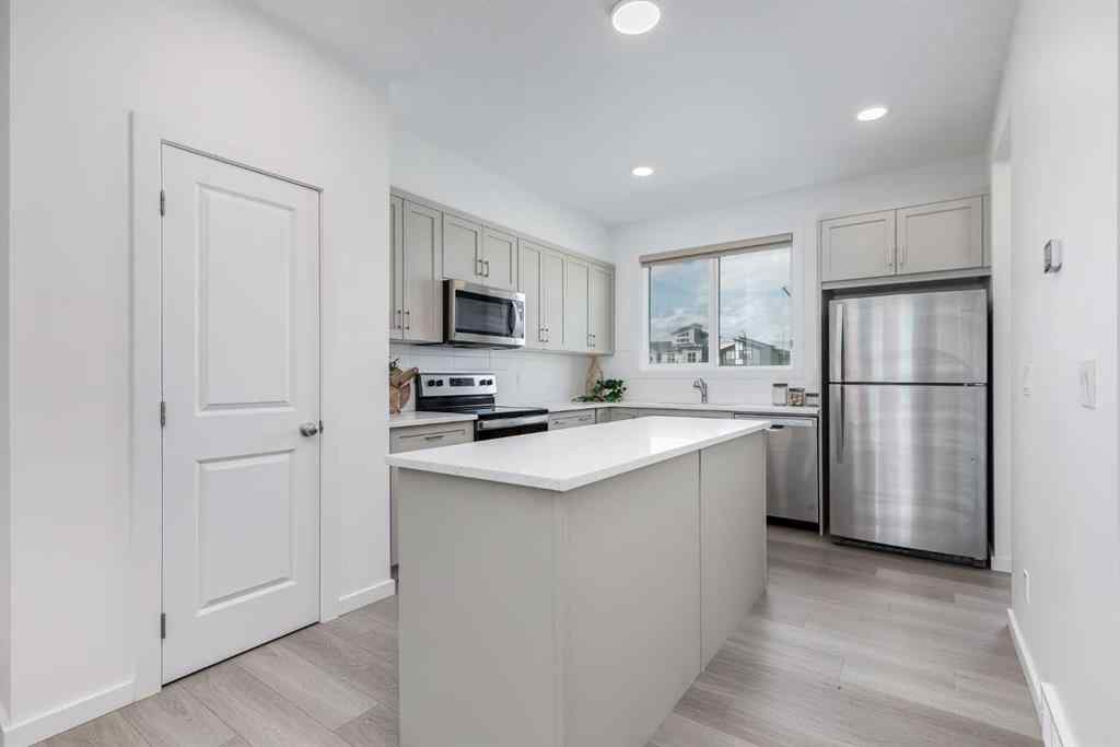 MLS® A2235108 - 61 Belmont Drive SW in Belmont Calgary, Residential