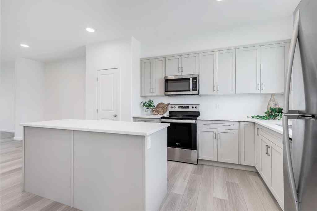 MLS® A2235108 - 61 Belmont Drive SW in Belmont Calgary, Residential