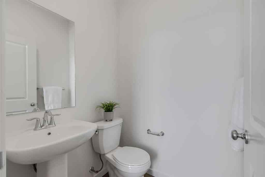 MLS® A2235108 - 61 Belmont Drive SW in Belmont Calgary, Residential