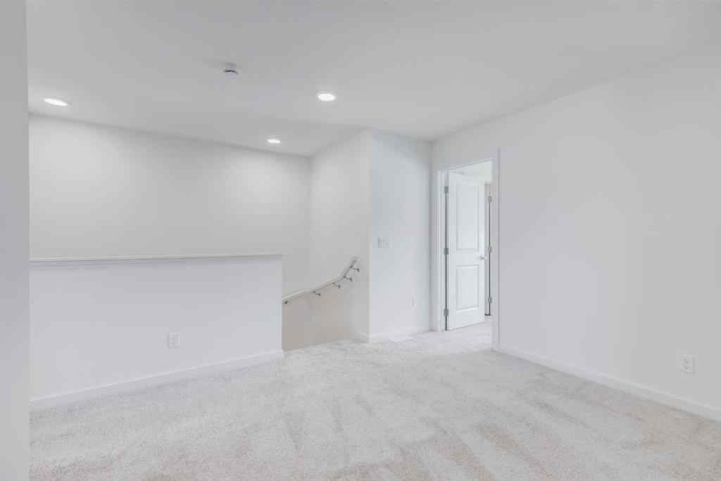 MLS® A2235108 - 61 Belmont Drive SW in Belmont Calgary, Residential