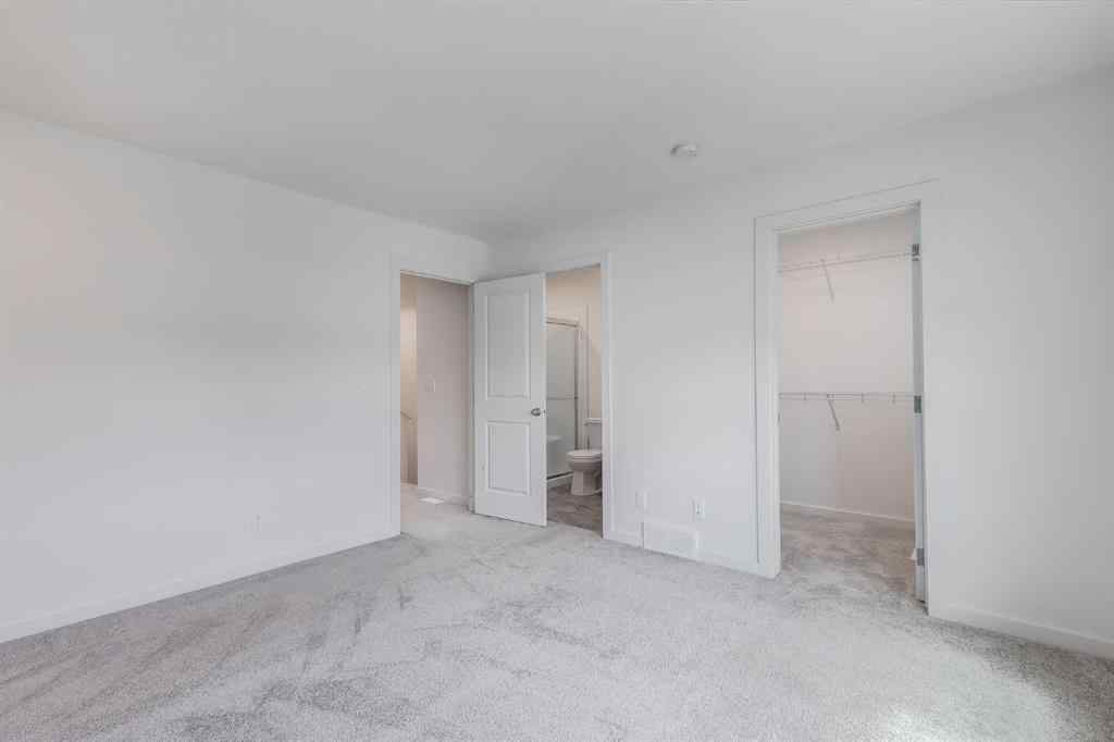 MLS® A2235108 - 61 Belmont Drive SW in Belmont Calgary, Residential