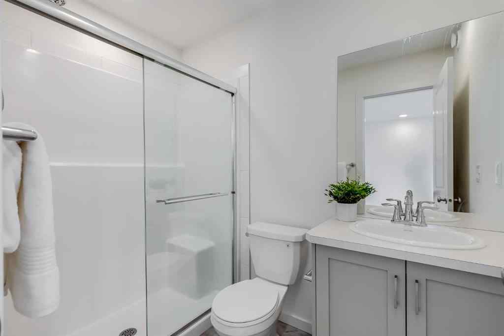 MLS® A2235108 - 61 Belmont Drive SW in Belmont Calgary, Residential