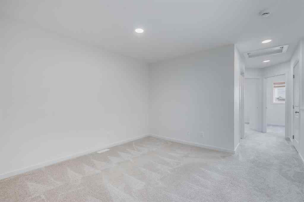 MLS® A2235108 - 61 Belmont Drive SW in Belmont Calgary, Residential
