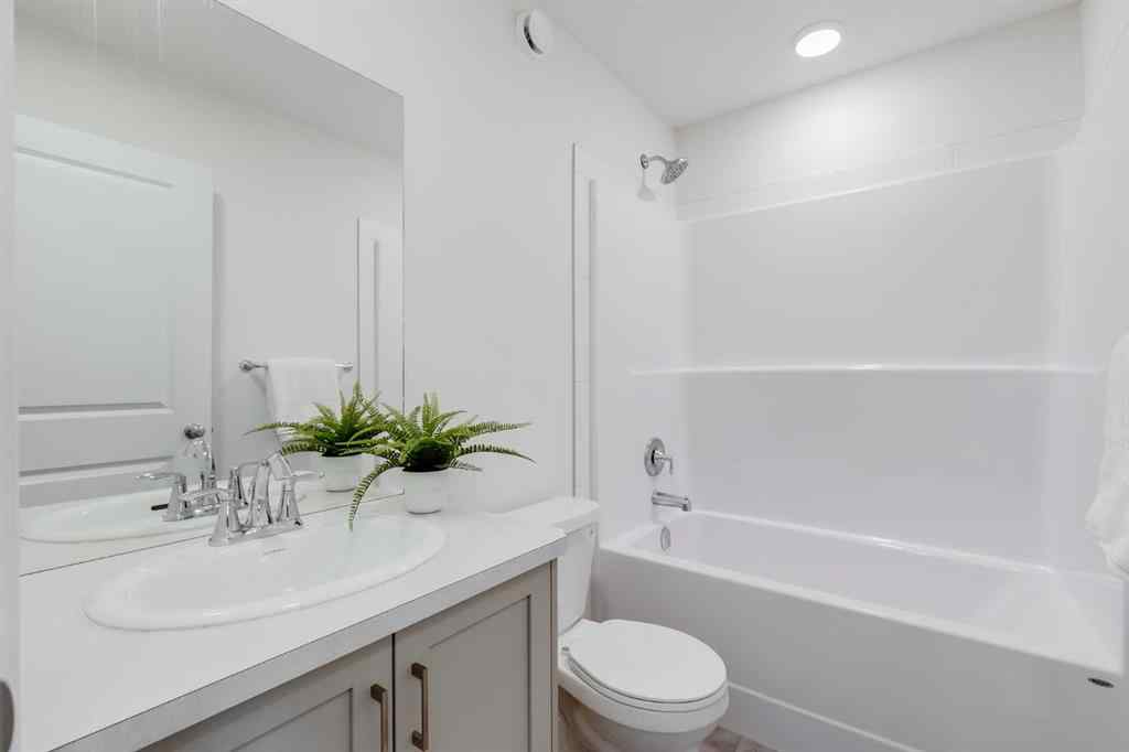 MLS® A2235108 - 61 Belmont Drive SW in Belmont Calgary, Residential