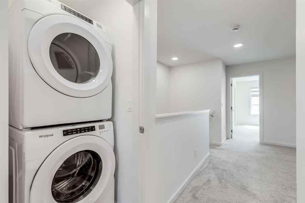 MLS® A2235108 - 61 Belmont Drive SW in Belmont Calgary, Residential