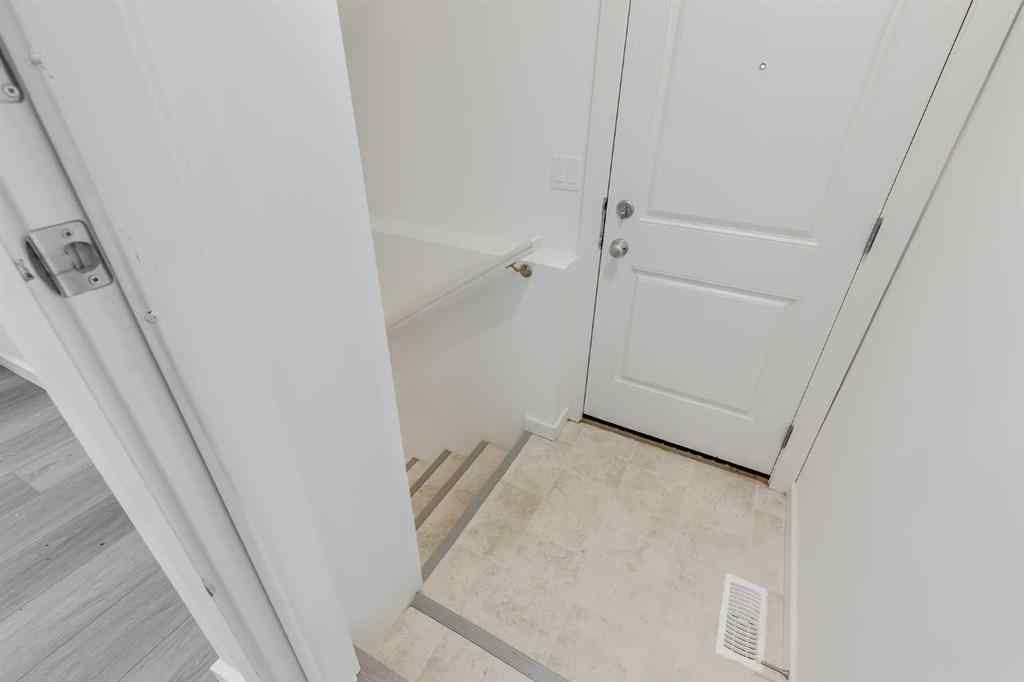 MLS® A2235108 - 61 Belmont Drive SW in Belmont Calgary, Residential