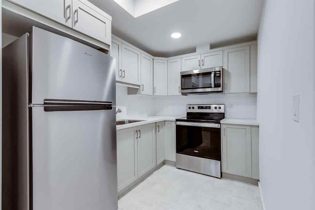 MLS® A2235108 - 61 Belmont Drive SW in Belmont Calgary, Residential