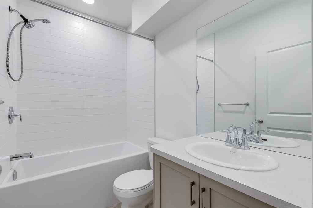 MLS® A2235108 - 61 Belmont Drive SW in Belmont Calgary, Residential