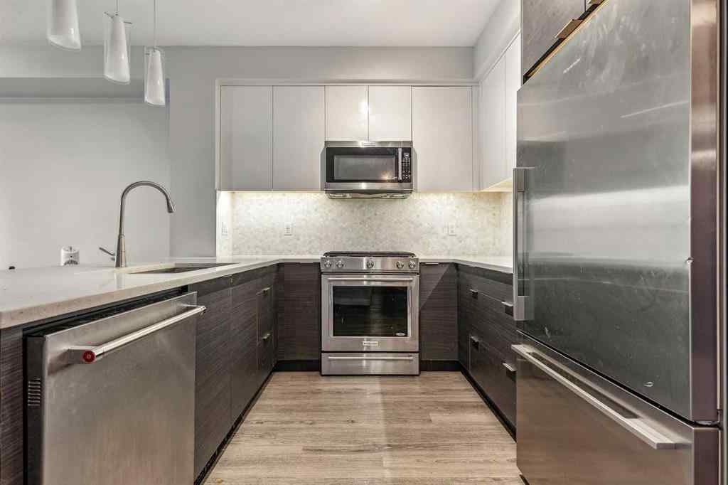 MLS® A2235193 - Unit #1210 95 Burma Star Road SW in Currie Barracks Calgary, Residential