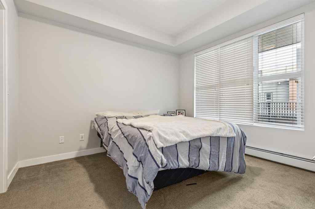 MLS® A2235193 - Unit #1210 95 Burma Star Road SW in Currie Barracks Calgary, Residential