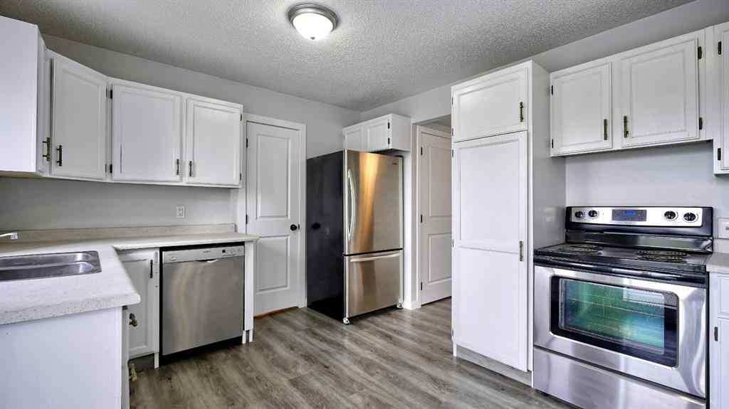 MLS® A2235243 - 124 Riverbrook Way SE in Riverbend Calgary, Residential
