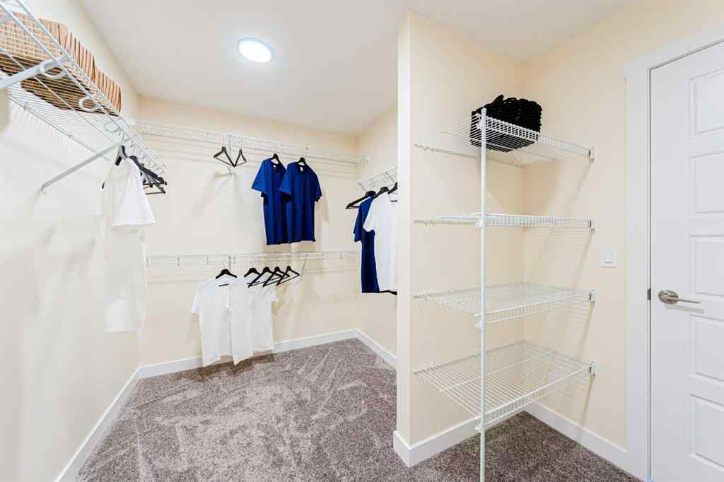 MLS® A2235359 - 711 Buffaloberry Manor SE in NONE Calgary, Residential