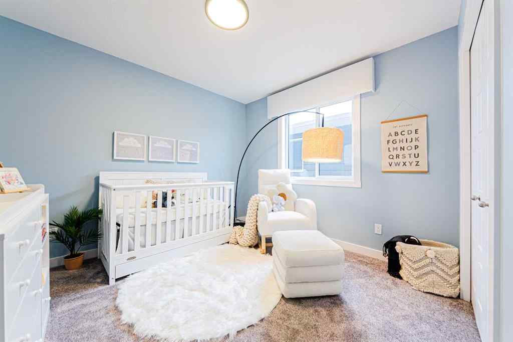 MLS® A2235359 - 711 Buffaloberry Manor SE in NONE Calgary, Residential